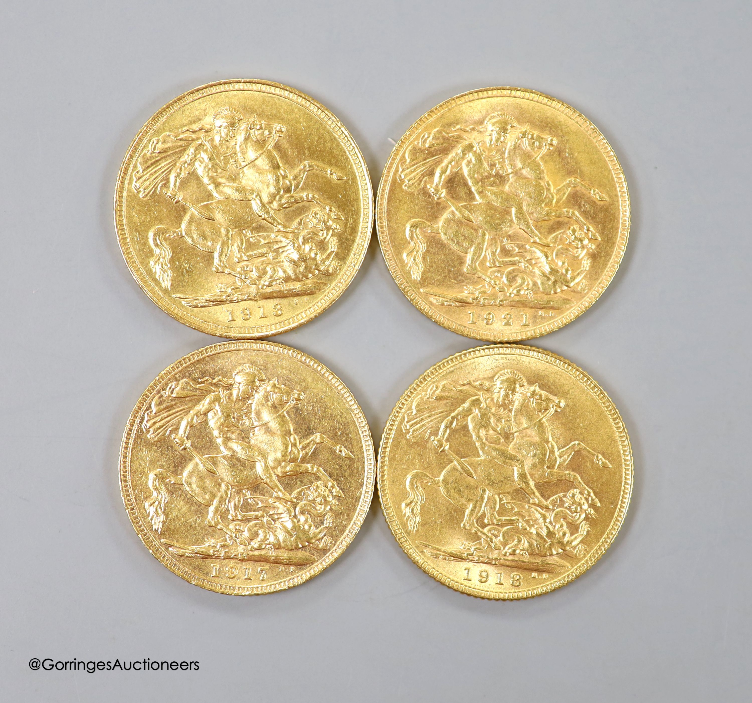 Four George V gold sovereigns, 1913 (one Sydney mint) 1917M, 1918 and 1921P